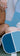 Two women sitting on pickleball court with GAMMA pickleball paddles
