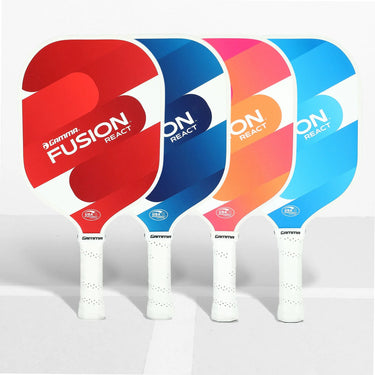 A set of GAMMA Fusion React Pickleball Paddles in red, blue, and multicolor designs with white grips.
